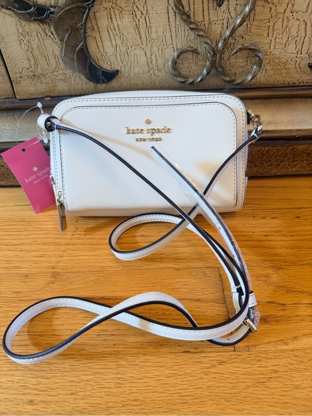 kate spade white leather crossbody bag with gold logo